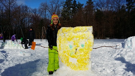 Picture of kid making Sponge Bob in the snow